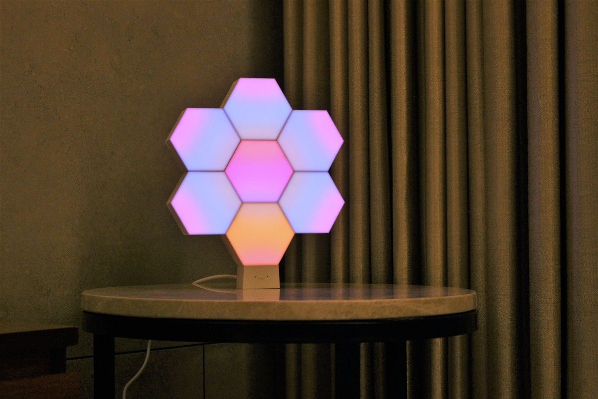 Cololight Hexagon Light Plus Kit assembled in a multicolor flower pattern