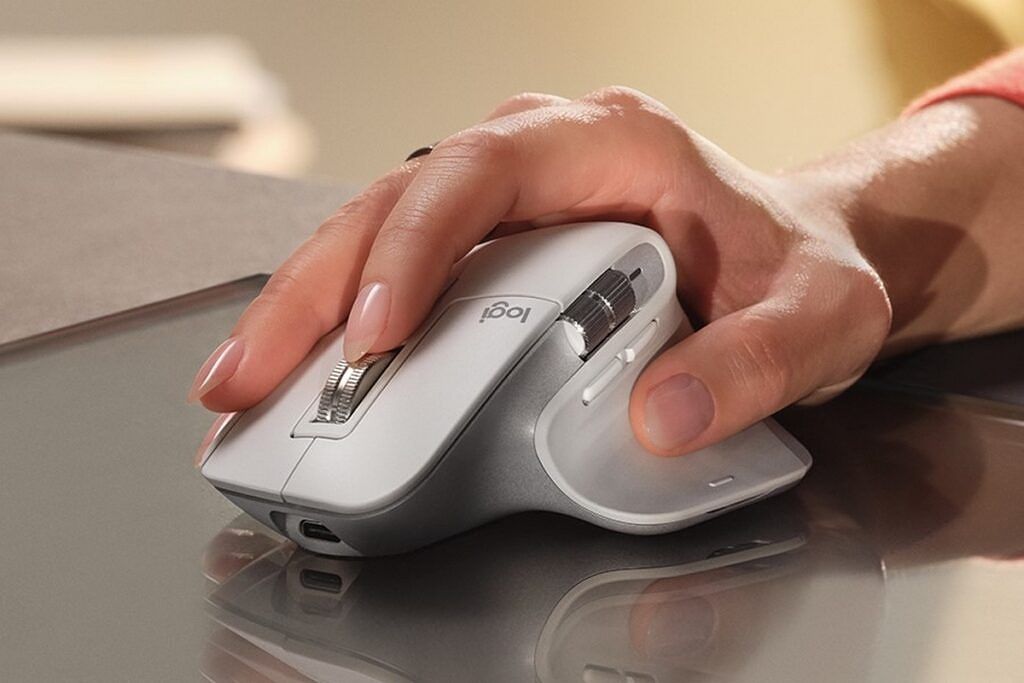 Logitech MX Master 3S mouse in a person's hand