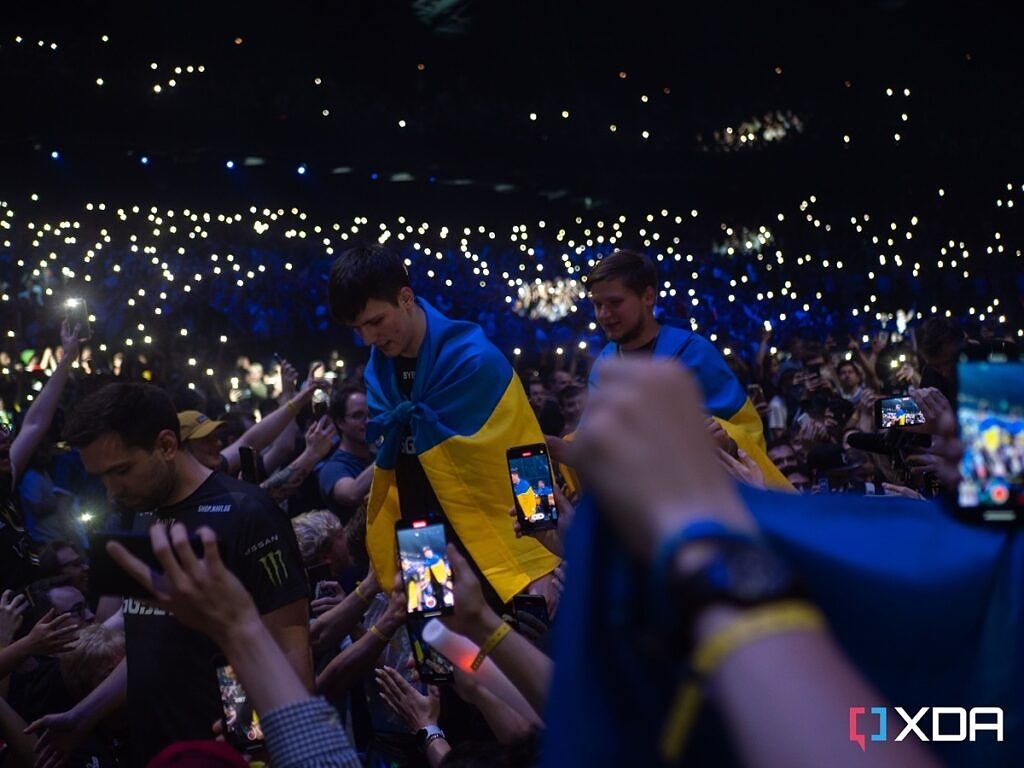 Valerii &quot;b1t&quot; Vakhovskyi and Oleksandr &quot;s1mple&quot; Kostyliev, two Ukrainian players for Natus Vincere, walk to the stage