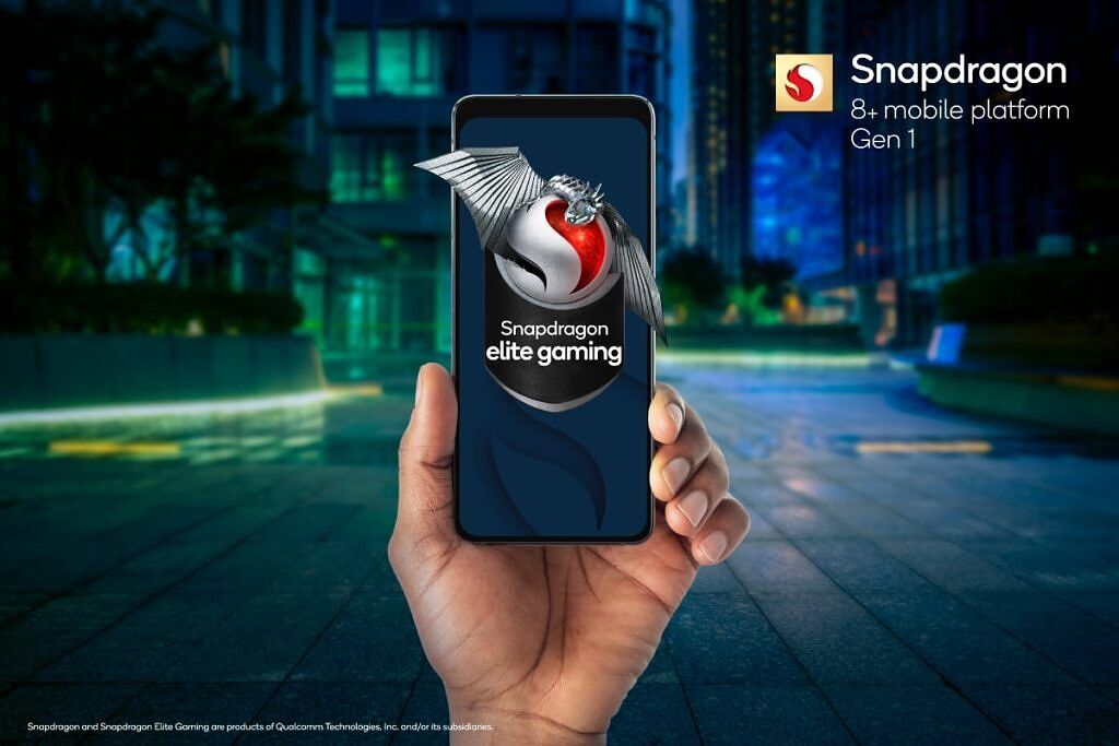 Qualcomm Snapdragon 8 Plus Gen 1 reference design smartphone in hand with urban landscape in the background