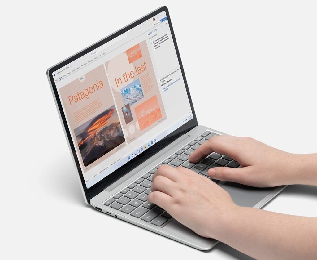A person typing on a Surface Laptop Go 2