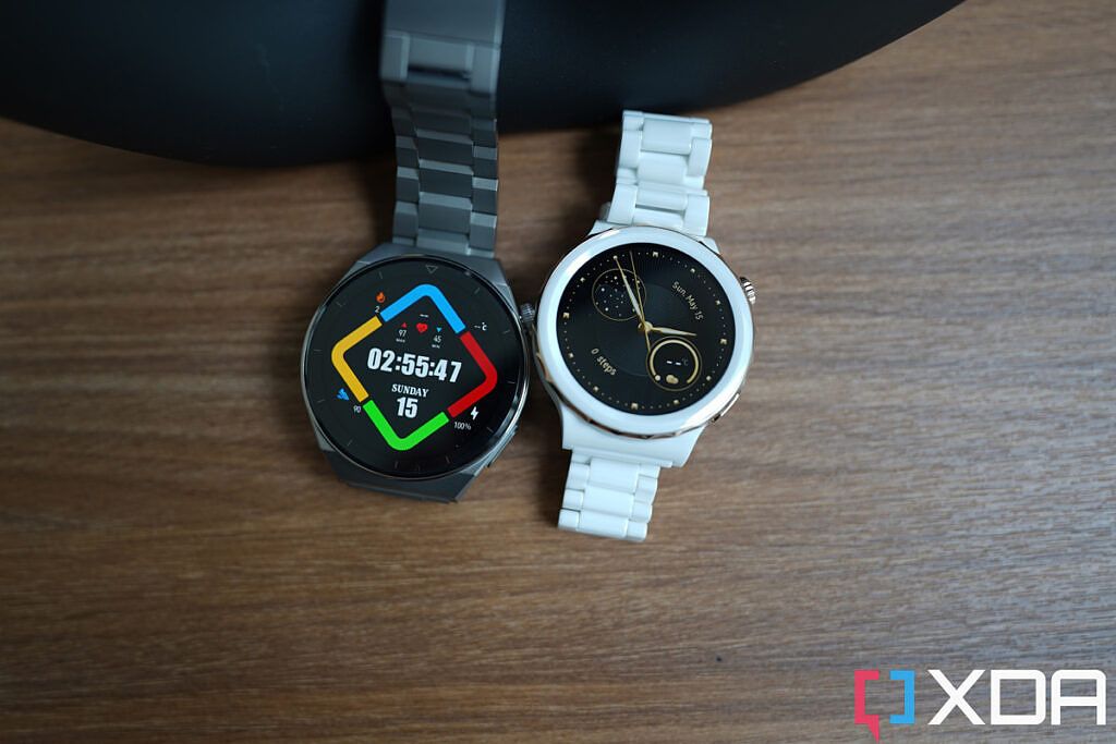 Huawei Watch GT 3 Pro ceramic edition and titanium ediiton sitting side by side on a table