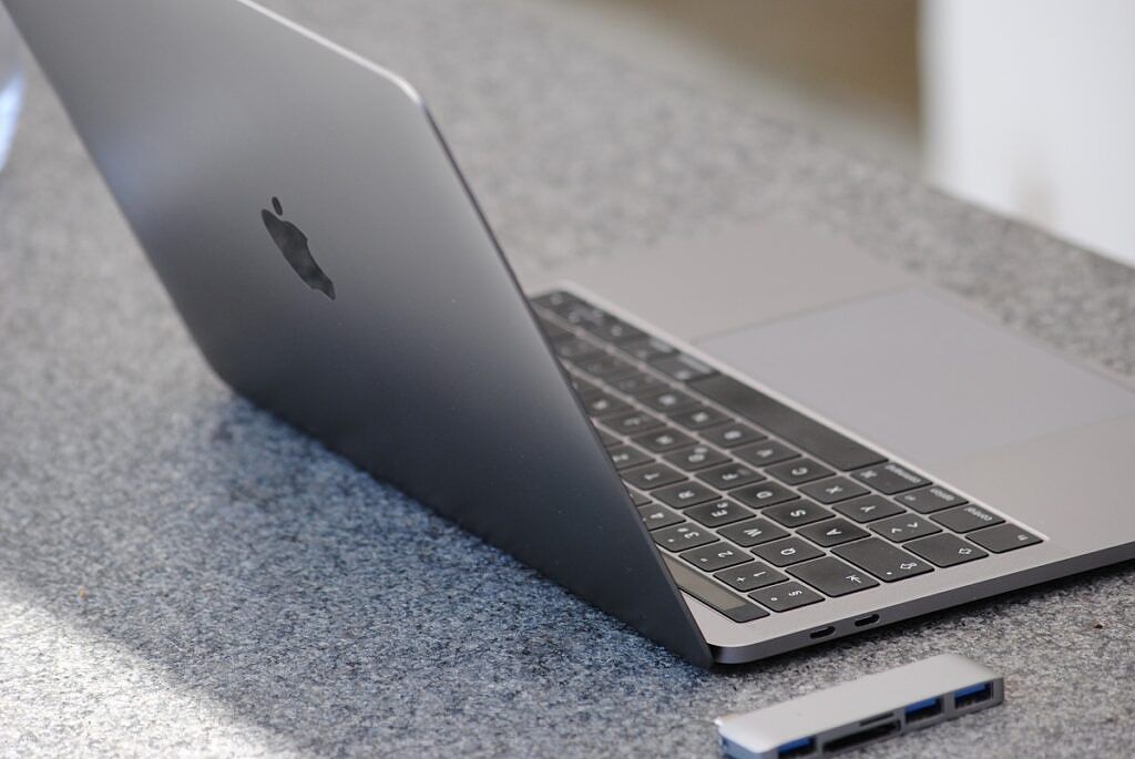 Grey Macbook Pro and USB-C adaptor