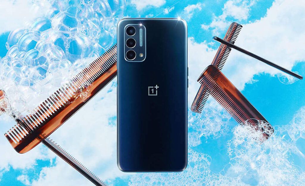 A blue-colored OnePlus Nord N200 5G smartphone with a light sky and some bubbles in the background