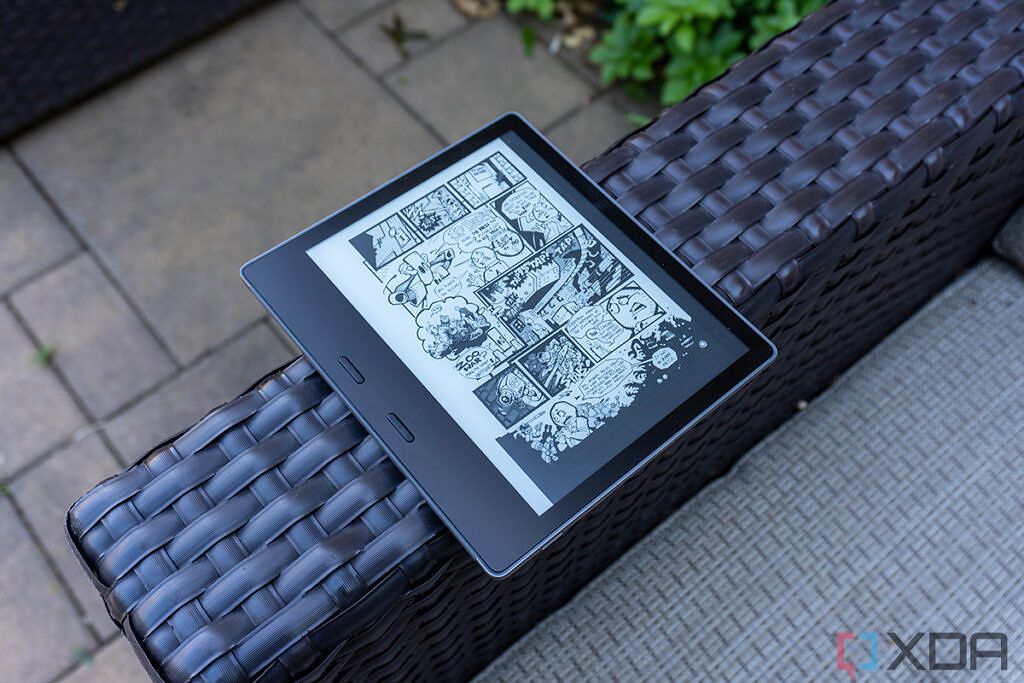 Kindle Oasis with comic book open