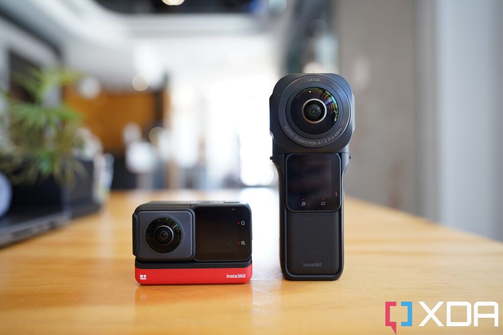 insta360 one rs and 1-inch edition standing on a table. 