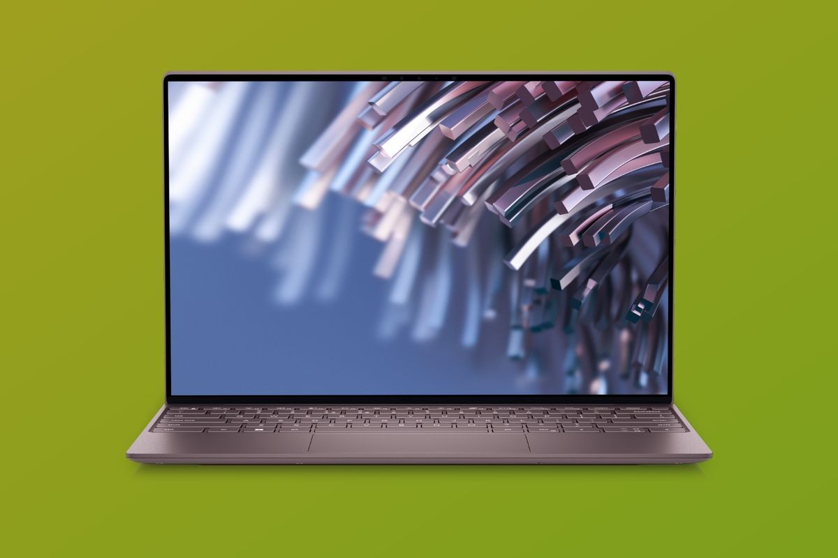 Front view of the 2022 Dell XPS 13 in Umber over a yellow and green gradient