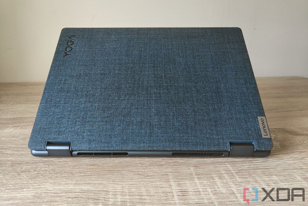 Rear view of the Lenovo Yoga 6 Gen 7 showing off the fabric-covered lid and rounded edges around the base