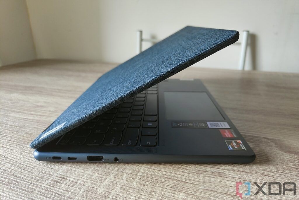 Left-side view of the Lenovo Yoga 6 Gen 7 with the lid open at about 45 degrees