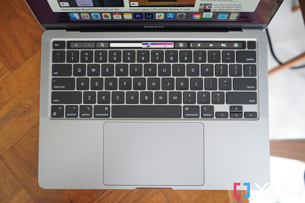 M2 Macbook Pro keyboard and trackpad with Touch Bar