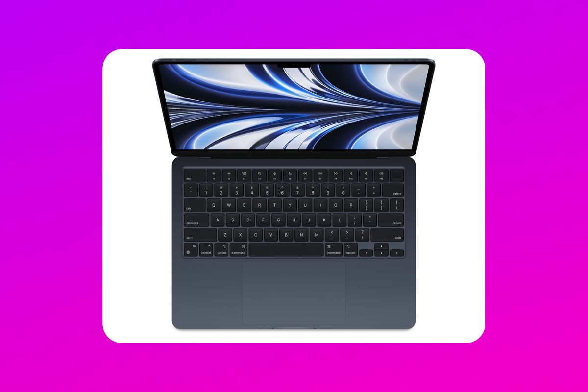 MacBook Air 2022 overhead view over a pink and purple background