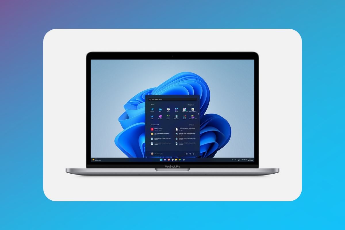 MacBook Pro 13 (2022) front view with Windows 11 on blue and purple background