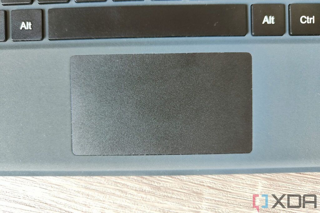 Close-up view of the touchpad on the One-Netbook T1's keyboard cover