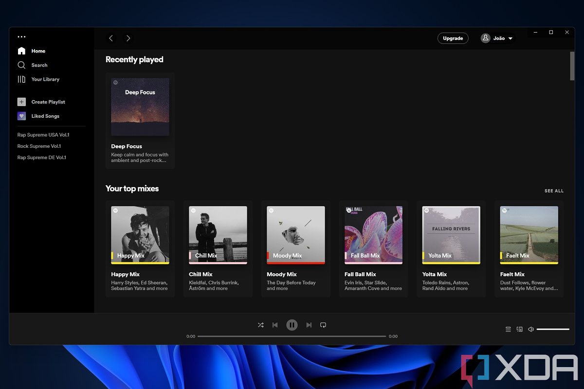 Spotify Windows app running with the default Windows 11 desktop background behind it