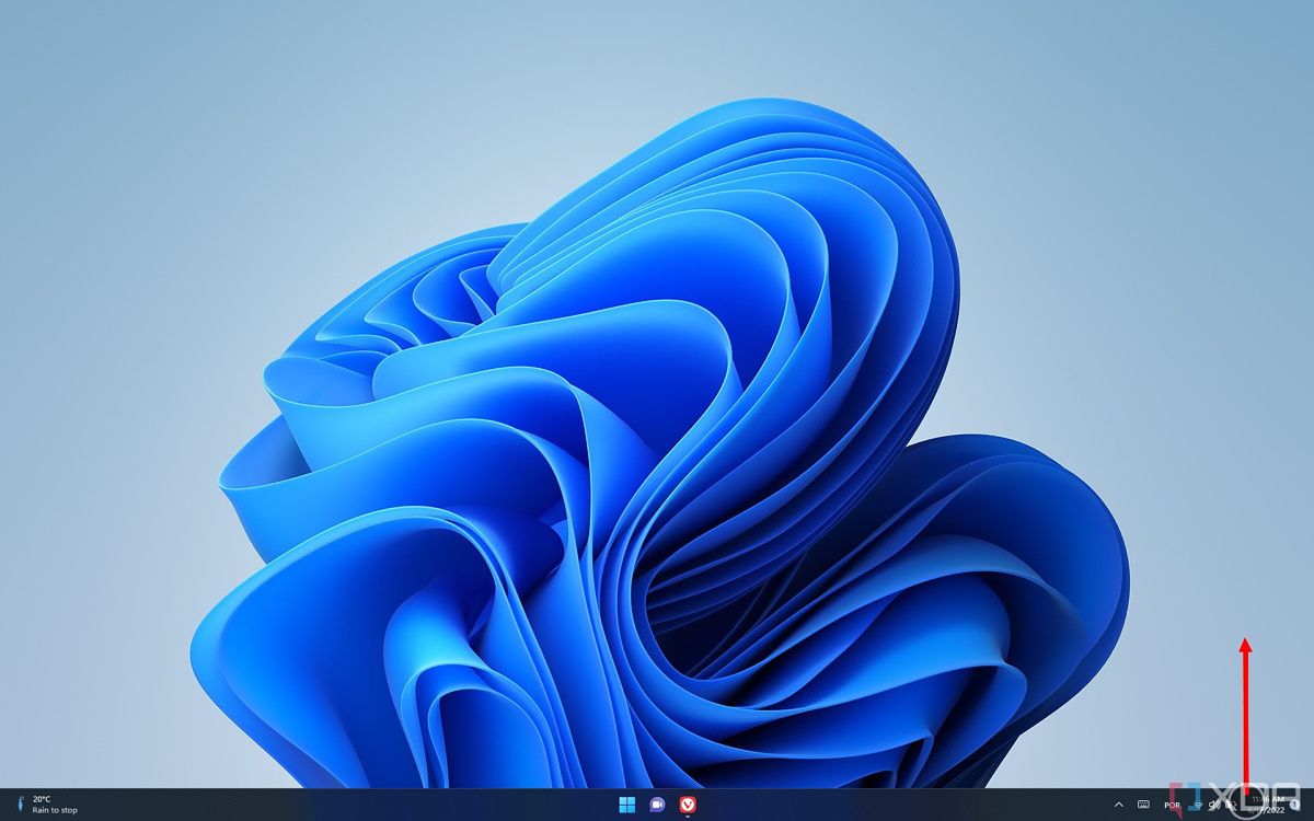 Imagen que muestra cómo deslizar el dedo desde el área de notificación abre el panel de configuración rápida en Windows 11