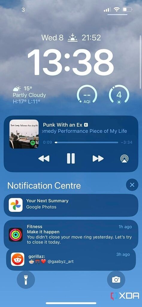 iOS 16 notificationc enter with Spotify playing and notifications