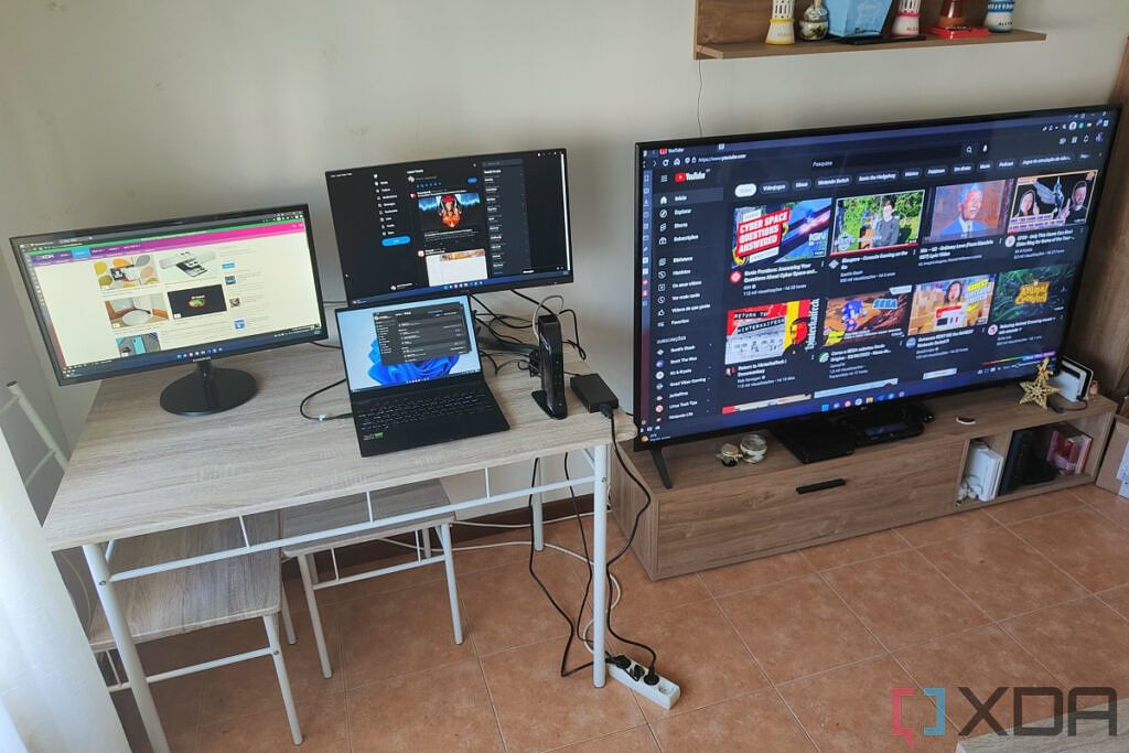 A laptop connected to the Plugable USB-C Triple 4K Display Docking Station