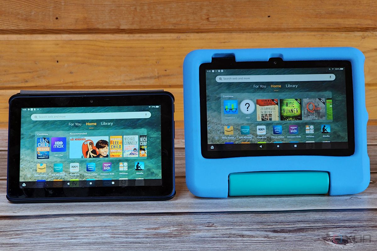 Fire 7 and Fire 7 Kids tablets sit on a table.