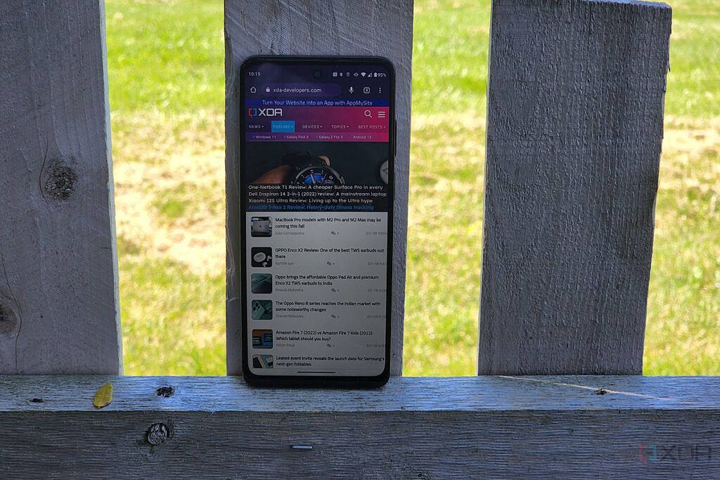 Moto G Stylus 5G rest on a fence post.