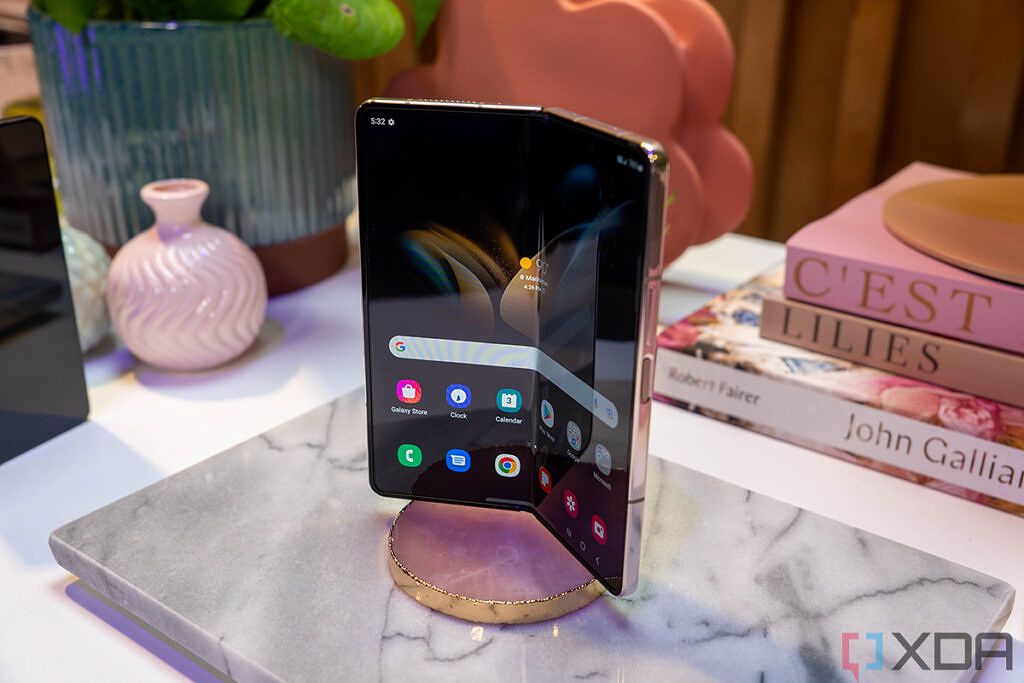 Galaxy Z Fold 4 standing on a desk in a half folded state