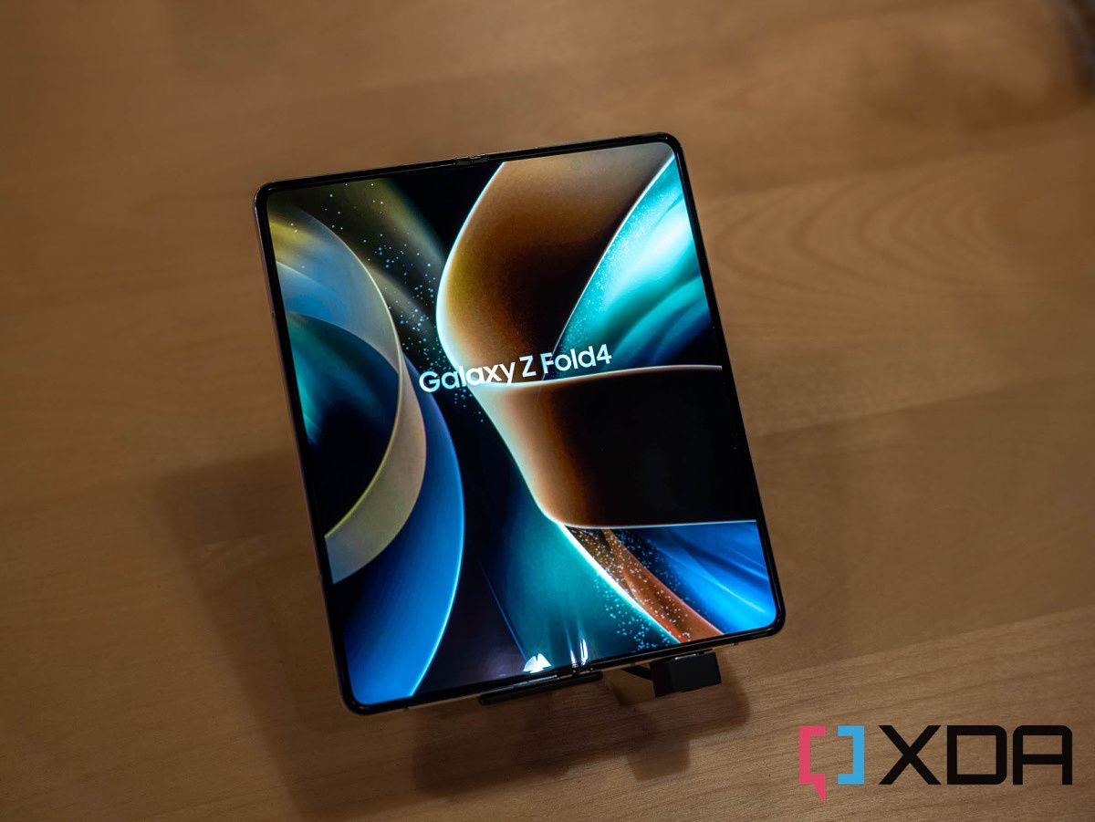 Samsung Galaxy Z Fold 4 on a stand on a wooden table