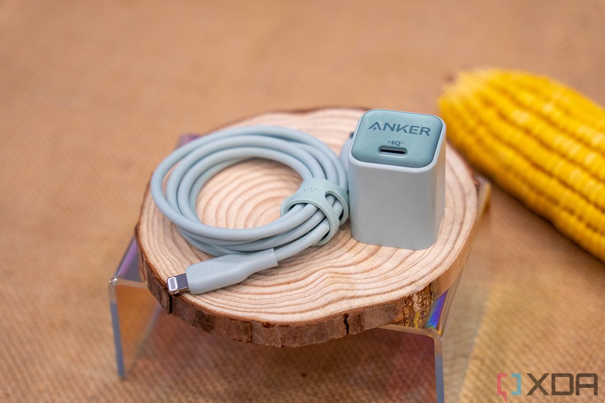 Anker Nano 3 and Bio-based charging cable on a wooden surface with an ear of corn in the background.