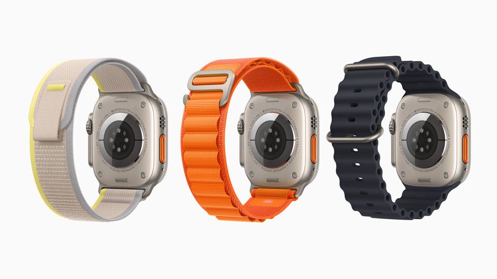 Apple Watch Ultras with different colors and bands.