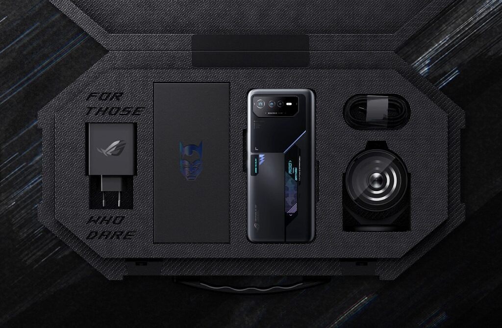 ROG Phone 6 Batman Edition in case with Batman-themed accessories.