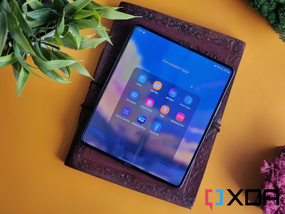 A Samsung Galaxy Z Fold 4 kept on a book with its display open