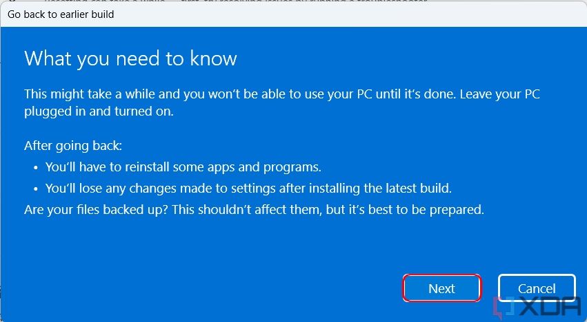 A Windows prompt warning users that some settings will be reverted after rolling back to a previous version