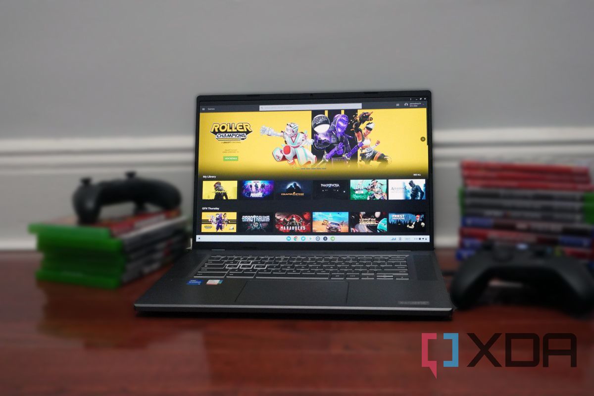 Acer Chromebook on a desk with video games and controllers