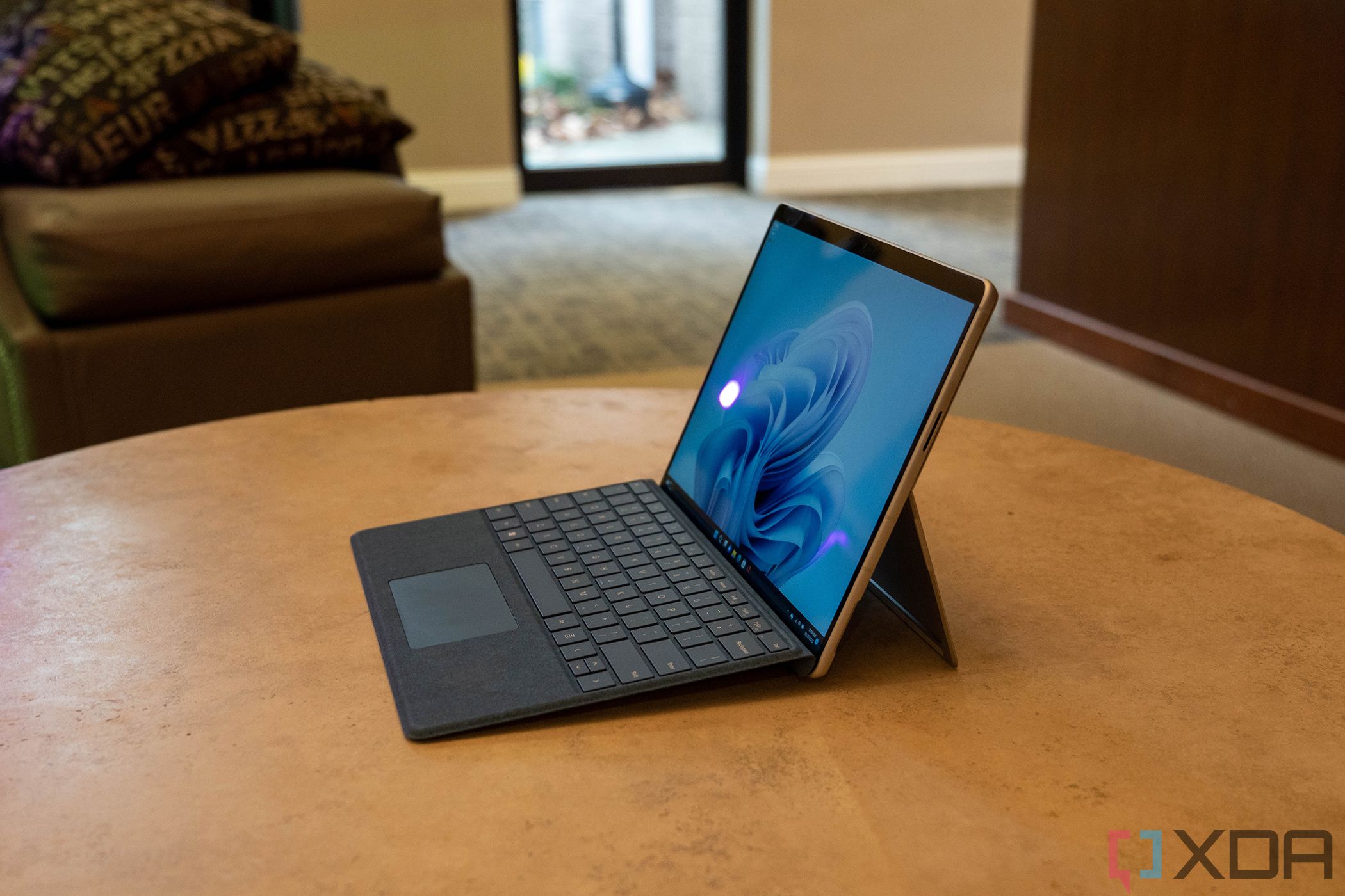 Surface Pro 9 open on a wooden table