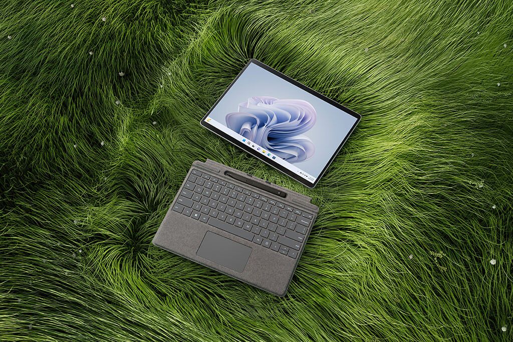 Surface Pro 9 and keyboard on fake grass background
