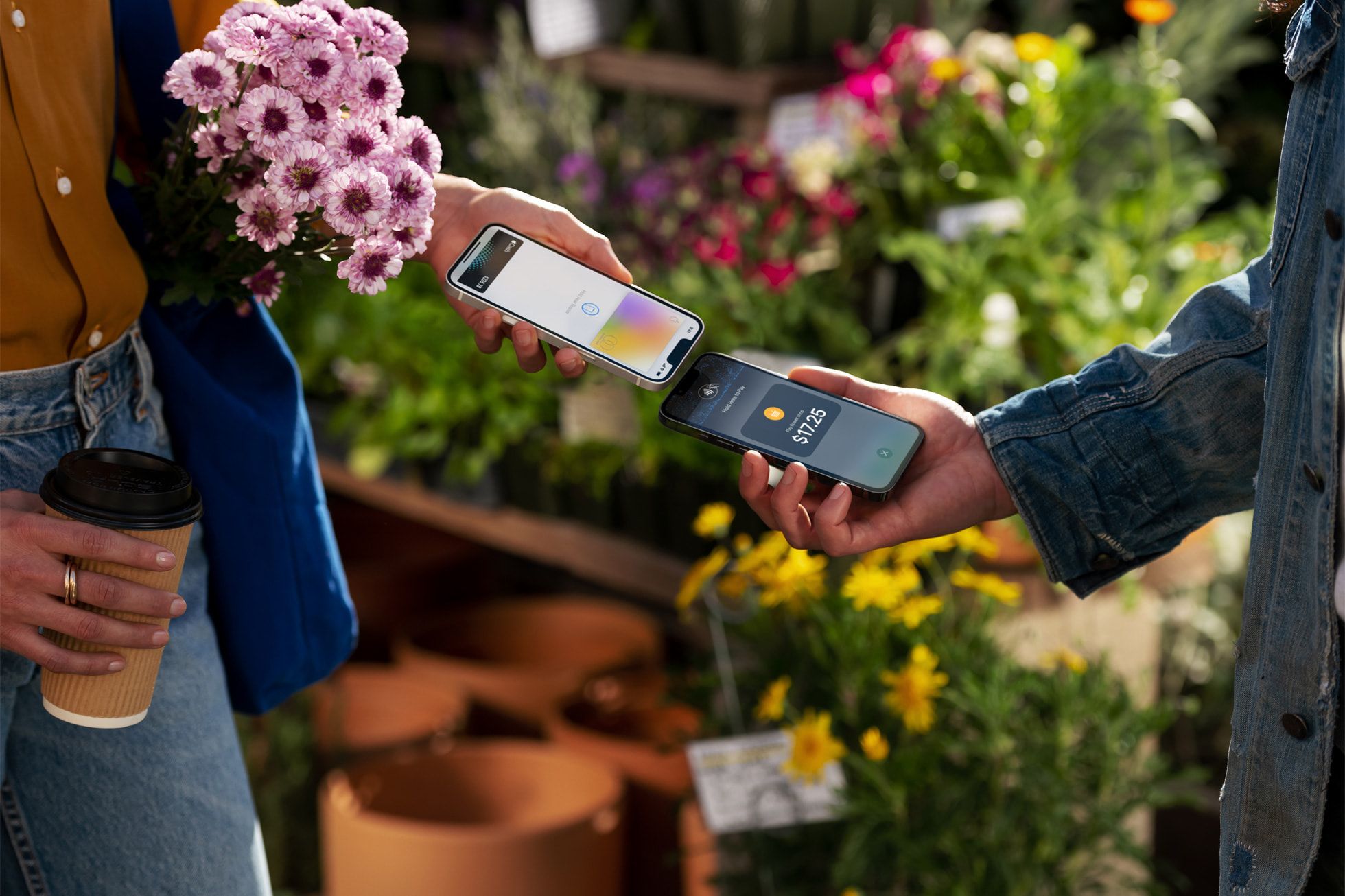Apple Tap to Pay support transaction occuring in a flower market
