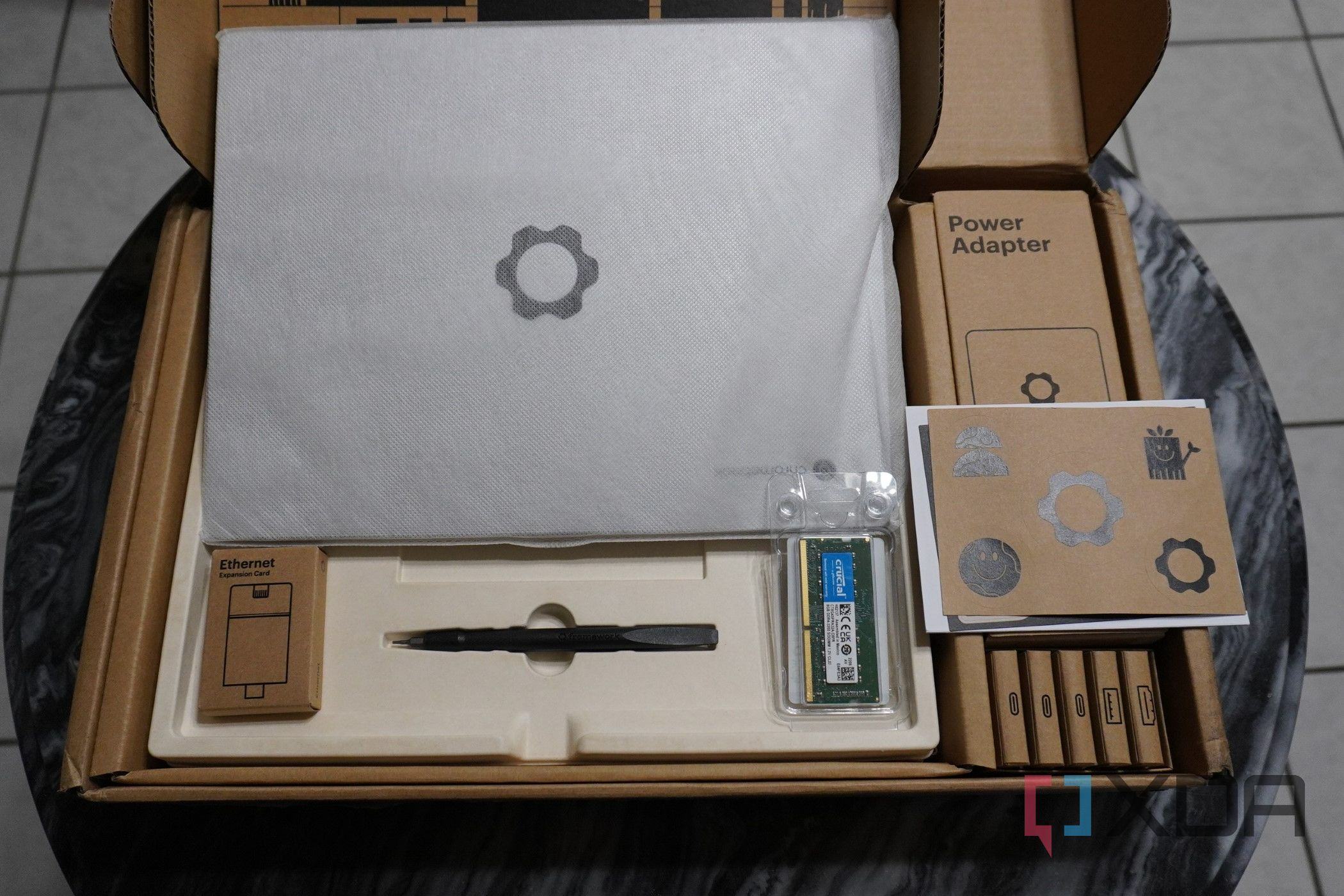 All of the contents of the Framework Chromebook box.