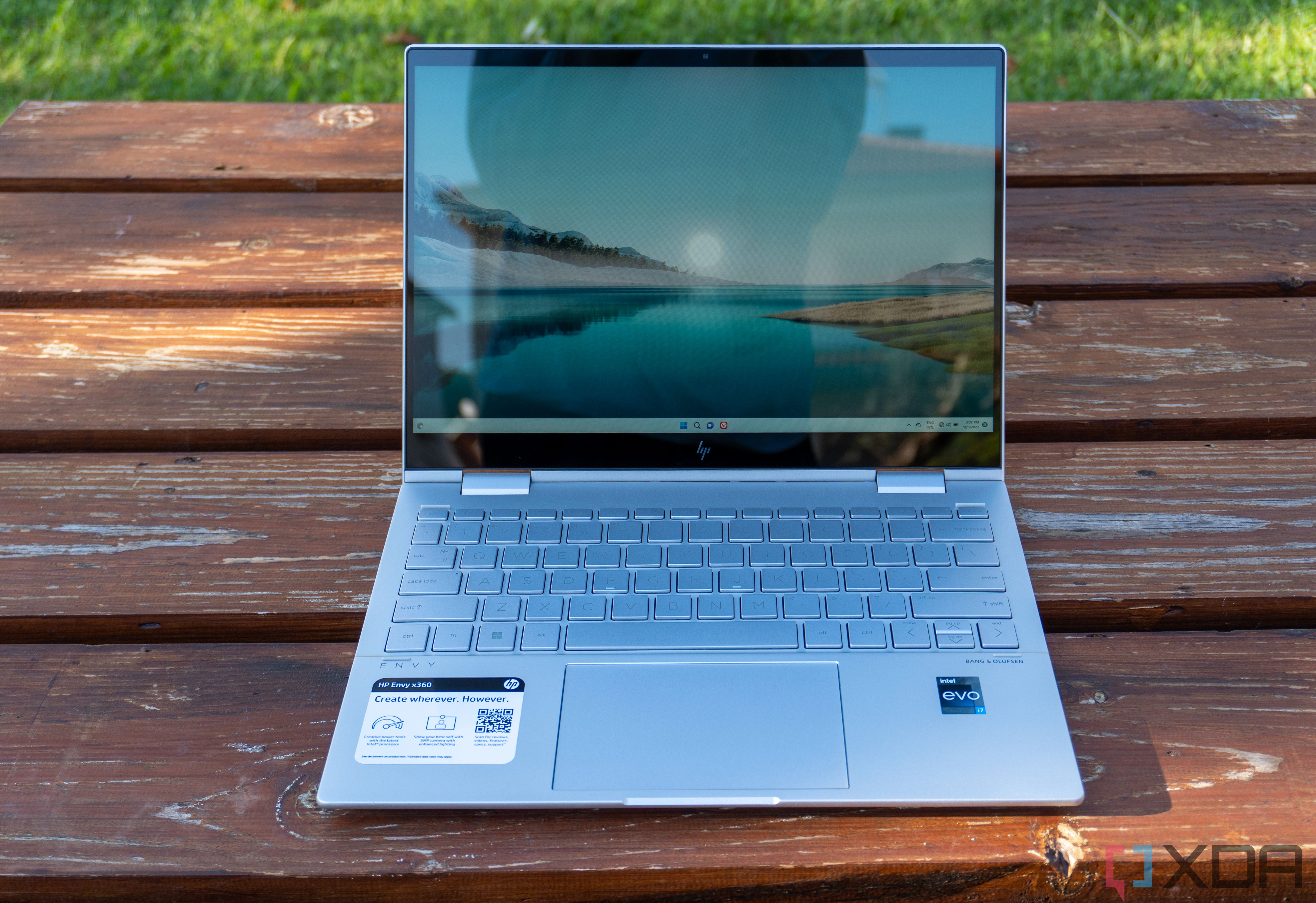 Front view of the HP Envy x360 13 with the lid open at roughly 100 degrees