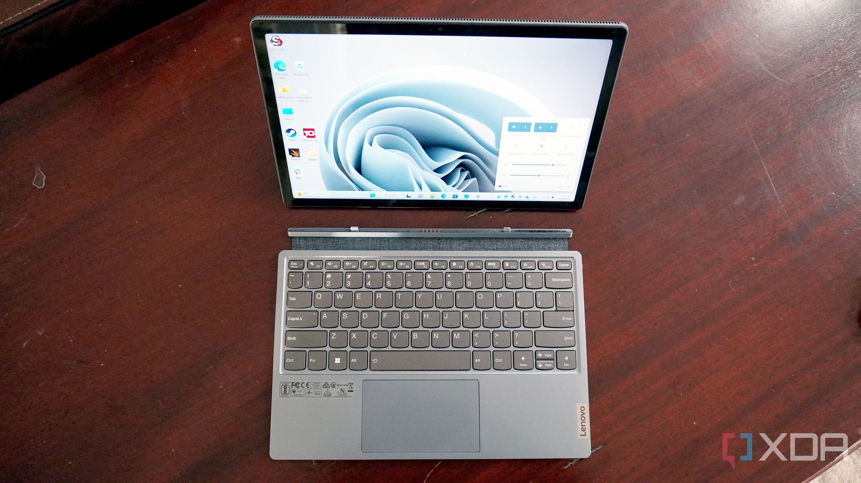 The IdeaPad Duet 5i keyboard detached from the screen and in use.