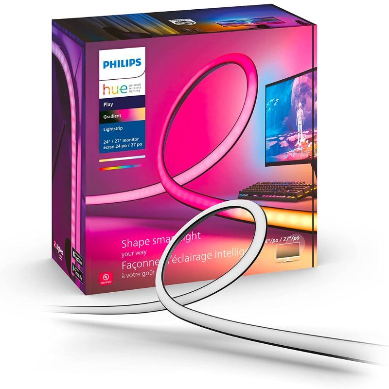 A render of the Philips Hue Play gradient PC lightstrip next to its retail box over a white-colored background.