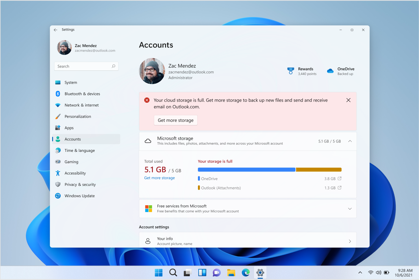 Screenshot of the Windows 11 Settings app showing updating cloud storage information for a linked Microsoft account, including OneDrive storage and Outlook attachments