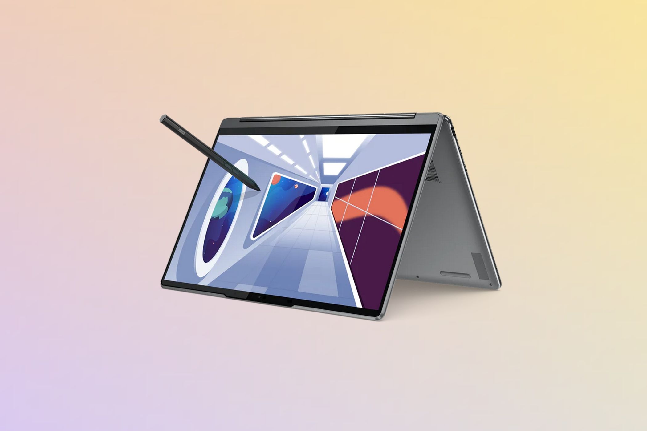 Angled view of the Lenovo Yoga 9i in tent mode in Storm Grey with the screen facing left. A stylus is being used to interact with the display.