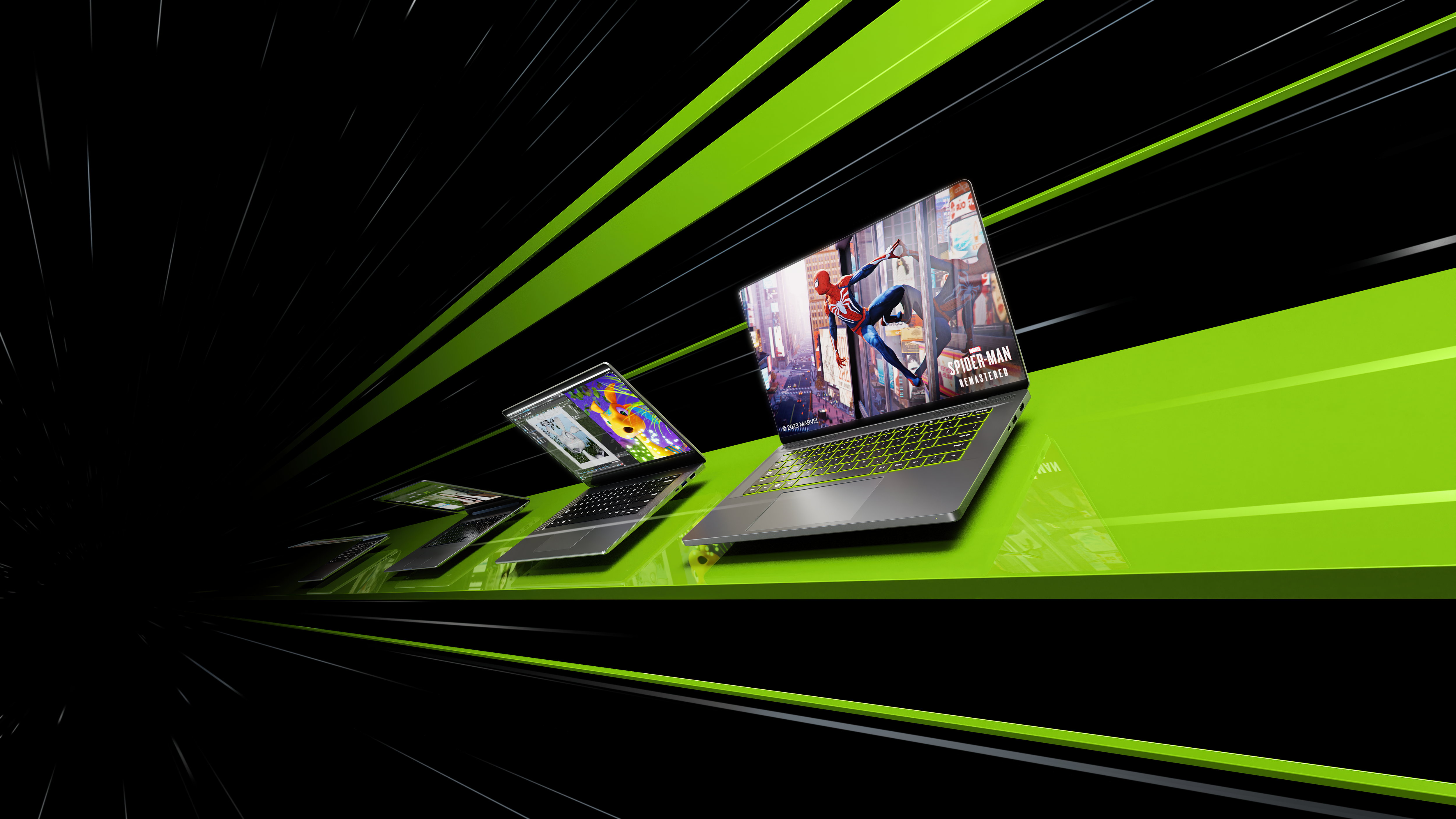 Perspective view of different laptops over a green stripe on a black background