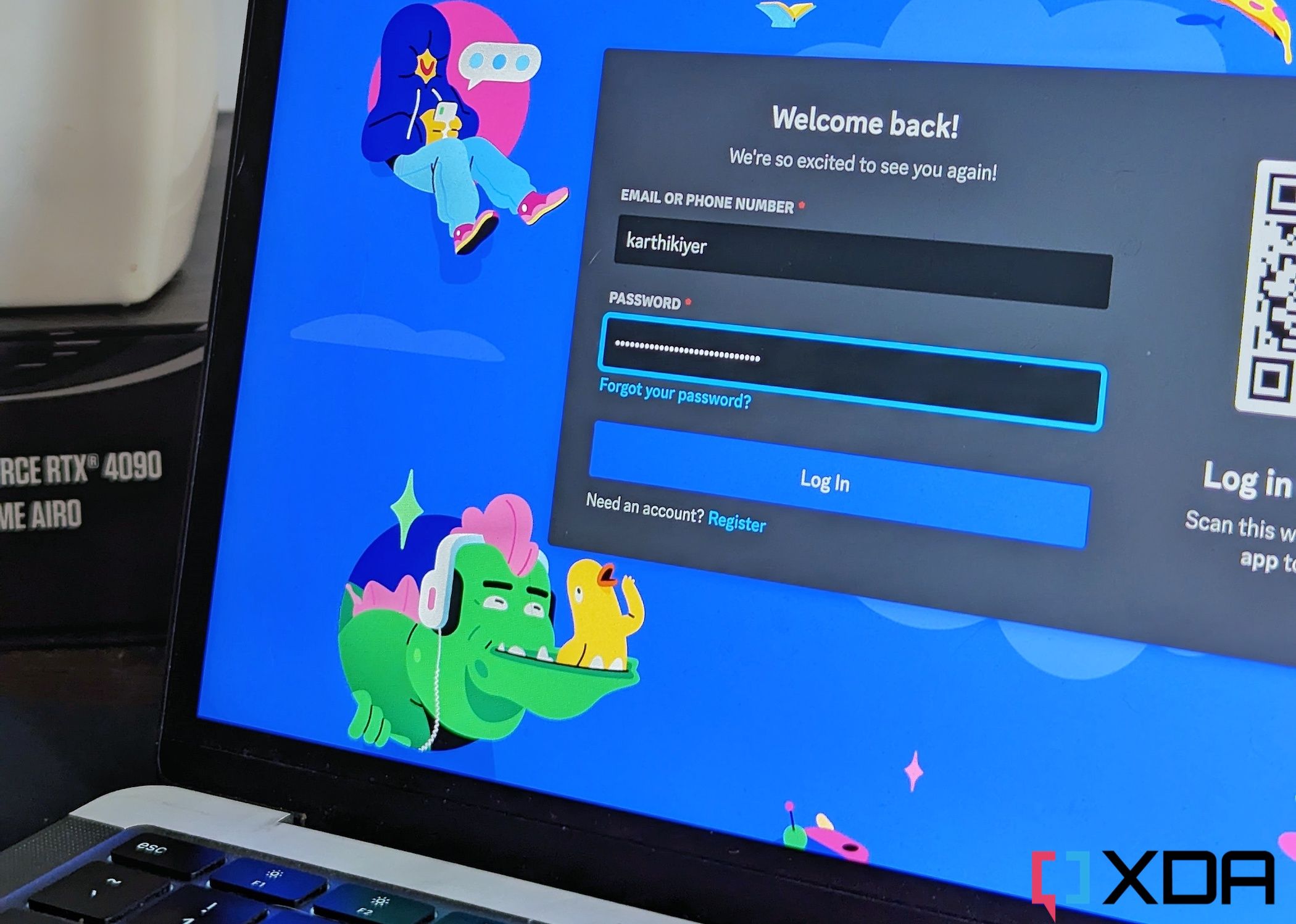 An image showing the login page of discord on a MacBook Air's display.