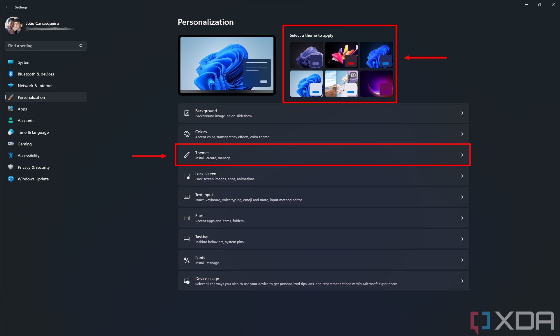 Screenshow of the Personalization page in Windows 11 Settings, with themes to choose from at the top.