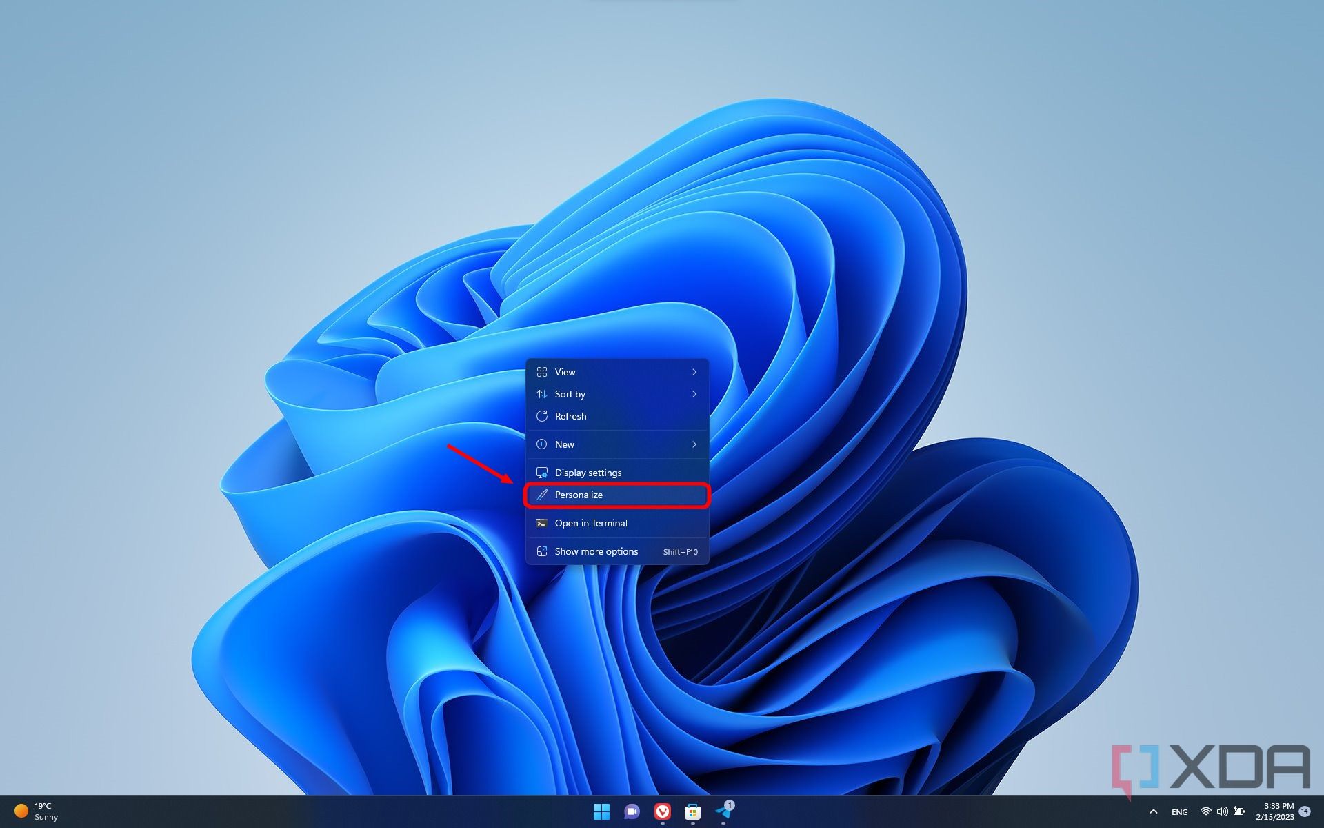 Screenshot of a Windows 11 desktop showing the desktop context menu. The Personalize option is highlighted