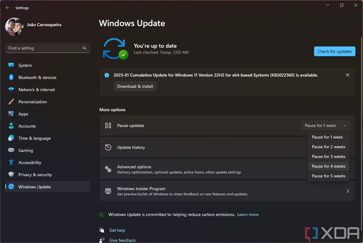 Screenshot of Windows Update with the dropdown menu open with different time periods available to pause updates
