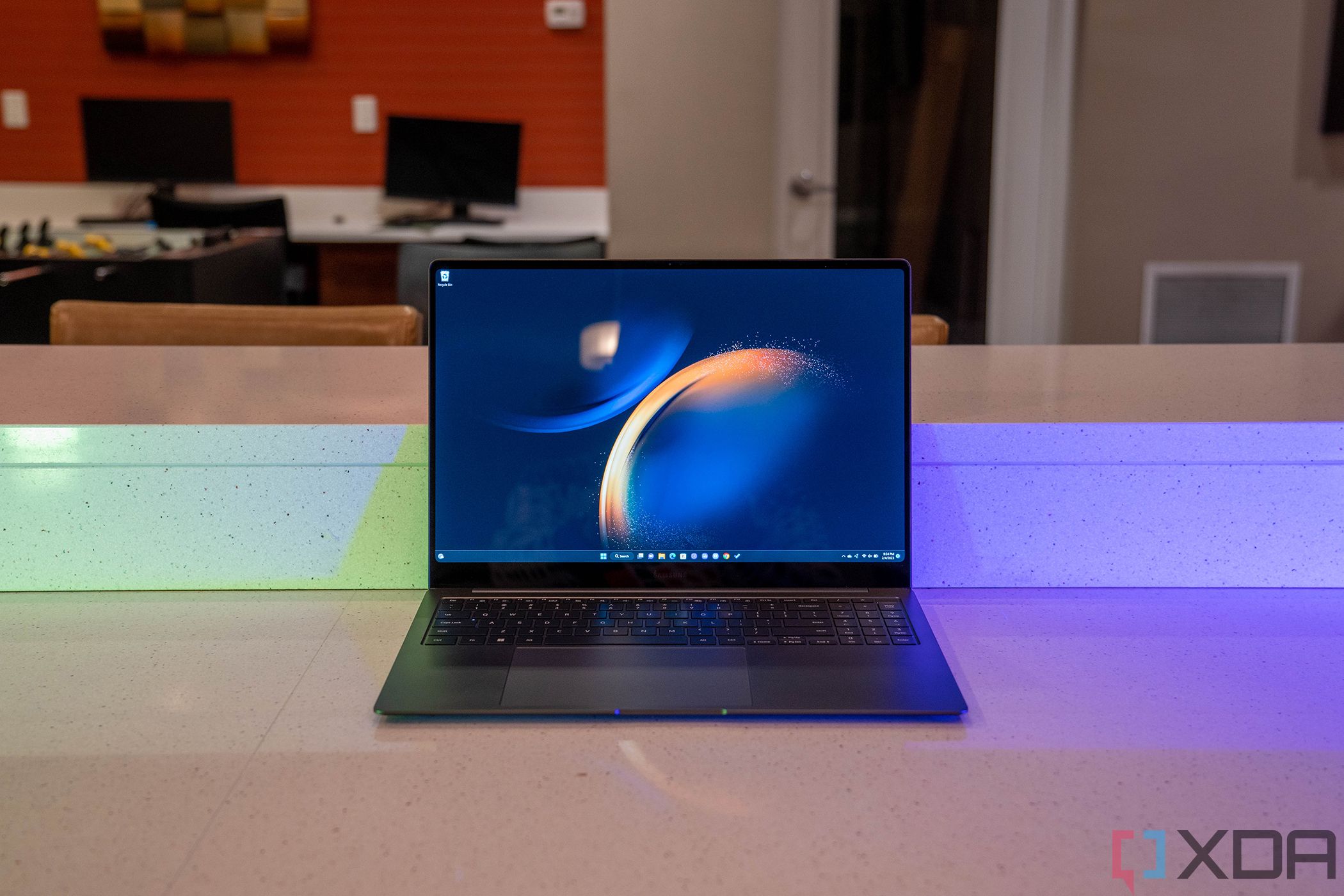 Front view of gray laptop on white countertop