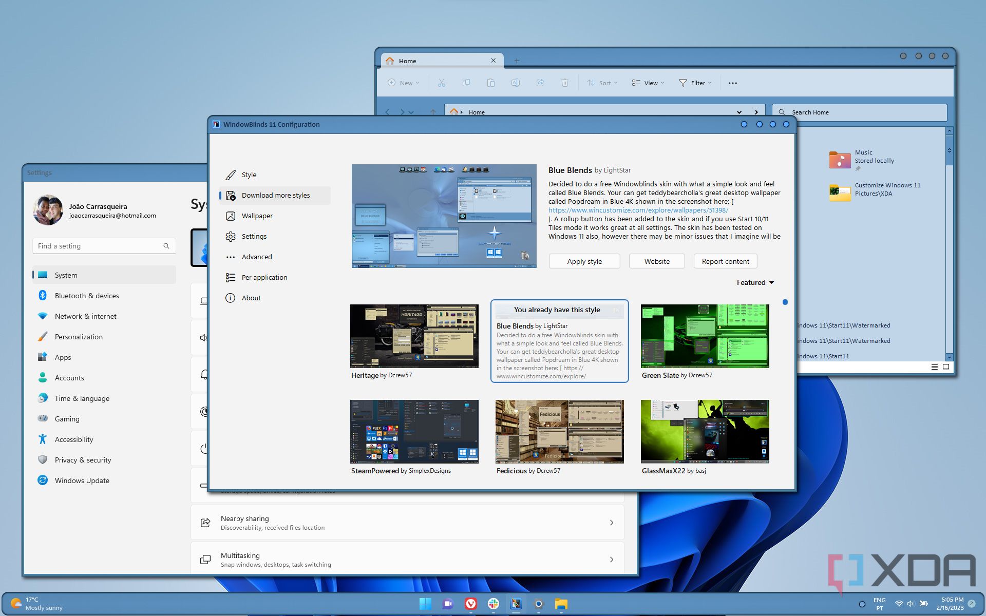 Screenshot of a Windows 11 desktop with various windows open and a custom blue theme applied
