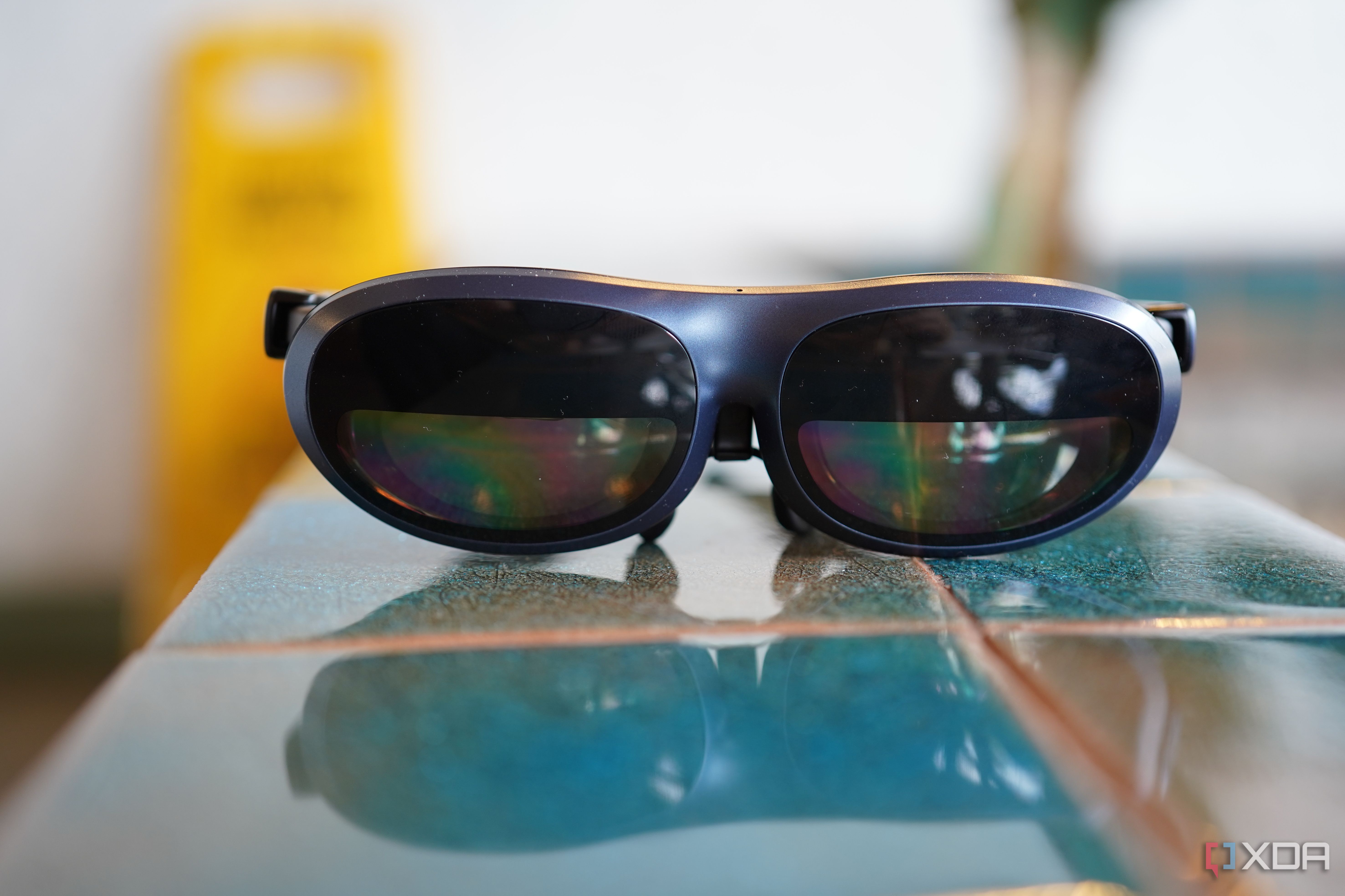Rokid Max AR glasses on a surface. 
