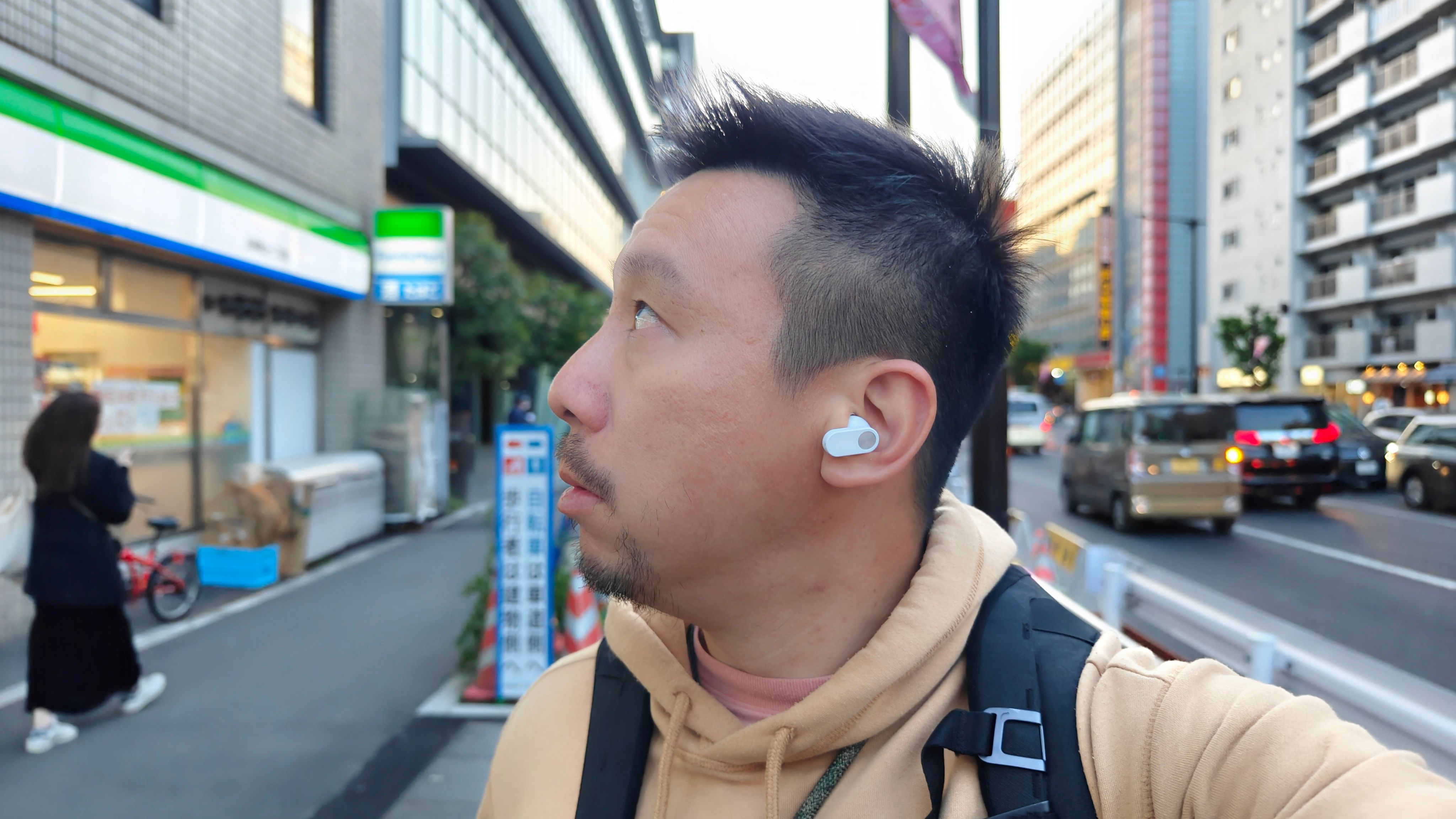 The OnePlus Nord Buds 2 in my ear in Tokyo. 