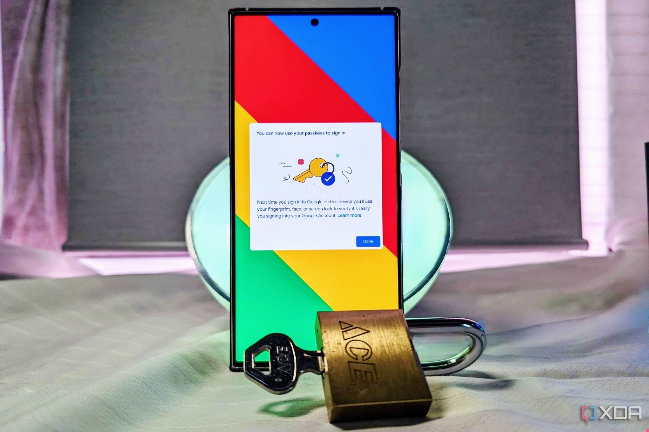 Samsung Galaxy S23 Ultra with confirmation on the screen beside a padlock and key